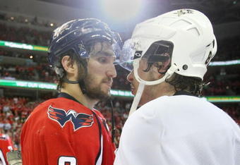 WASHINGTON - MAY 13:  Alex Ovechkin #8 of the Washington Capitals and Sidney Crosby #87 of the Pittsburgh Penguins shake hands after Pittsburgh's 6-2 victory in Game Seven of the Eastern Conference Semifinal  Round of the 2009 Stanley Cup Playoffs at Verizon Center on May 13, 2009 in Washington, DC.  (Photo by Bruce Bennett/Getty Images)