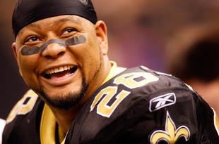 NEW ORLEANS - NOVEMBER 24:  Deuce McAllister #26 of the New Orleans Saints smiles after scoring on a 3 yard run for his 54th touch down to set a new team record while playing against the Green Bay Packers on November 24, 2009 at the Superdome in New Orleans, Louisiana. The Saints defeated the Packers 51-29.   (Photo by Chris Graythen/Getty Images)
