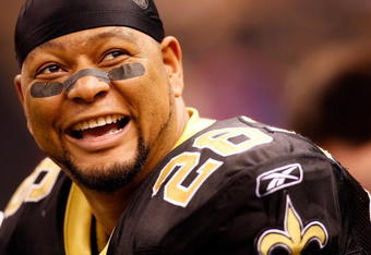 NEW ORLEANS - NOVEMBER 24:  Deuce McAllister #26 of the New Orleans Saints smiles after scoring on a 3 yard run for his 54th touch down to set a new team record while playing against the Green Bay Packers on November 24, 2009 at the Superdome in New Orleans, Louisiana. The Saints defeated the Packers 51-29.   (Photo by Chris Graythen/Getty Images)