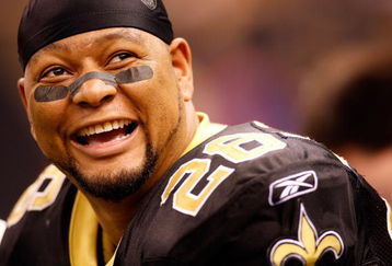 NEW ORLEANS - NOVEMBER 24:  Deuce McAllister #26 of the New Orleans Saints smiles after scoring on a 3 yard run for his 54th touch down to set a new team record while playing against the Green Bay Packers on November 24, 2009 at the Superdome in New Orleans, Louisiana. The Saints defeated the Packers 51-29.   (Photo by Chris Graythen/Getty Images)