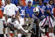 GAINESVILLE, FL - SEPTEMBER 30: Alabama Crimson wide receiver Earl Alexander #82 tries to catch the ball as Florida Gators defensive back Reggie Lewis #22 looks on September 30, 2006 at Ben Hill Griffin Stadium at Florida Field in Gainsville, Florida. (Photo by Marc Serota/Getty Images)