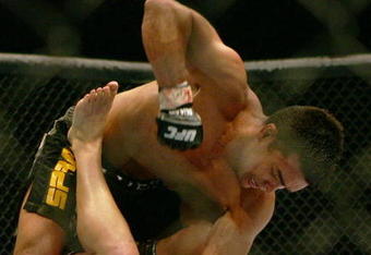 MANCHESTER, UNITED KINGDOM - APRIL 21: Lyoto Machida of Brazil and David Heath of England in action during a Welterweight bout of the Ultimate Fighting Championship at the Manchester Evening News Arena on April 21, 2007 in Manchester, England. (Photo by Gary M. Prior/Getty Images).