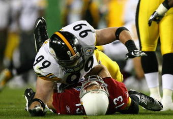 TAMPA, FL - FEBRUARY 01:  Kurt Warner #13 of the Arizona Cardinals gets hit by Brett Keisel #99 of the Pittsburgh Steelers during Super Bowl XLIII on February 1, 2009 at Raymond James Stadium in Tampa, Florida.  (Photo by Al Bello/Getty Images)