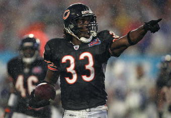 MIAMI GARDENS, FL - FEBRUARY 04:  Cornerback Charles Tillman #33 of the Chicago Bears celebrates after he recovered a fumble by Bryan Fletcher #81 of the Indianapolis Cots during the second quarter of Super Bowl XLI on February 4, 2007 at Dolphin Stadium in Miami Gardens, Florida.  (Photo by Jonathan Daniel/Getty Images)