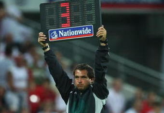 LONDON - JUNE 01:  Fourth official Daniel Bennett holds up the electronic board during the International Friendly match between England and Brazil at Wembley Stadium on June 1, 2007 in London, England.  (Photo by Clive Mason/Getty Images) 