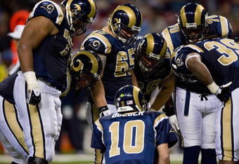 ST. LOUIS, MO - NOVEMBER 30:  Marc Bulger #10 of the St. Louis Rams calls a play in the huddle against the Miami Dolphins at the Edward Jones Dome on November 30, 2008 in St. Louis, Missouri.  The Dolphins beat the Rams 16-12.  (Photo by Dilip Vishwanat/Getty Images)