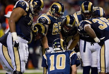ST. LOUIS, MO - NOVEMBER 30:  Marc Bulger #10 of the St. Louis Rams calls a play in the huddle against the Miami Dolphins at the Edward Jones Dome on November 30, 2008 in St. Louis, Missouri.  The Dolphins beat the Rams 16-12.  (Photo by Dilip Vishwanat/Getty Images)