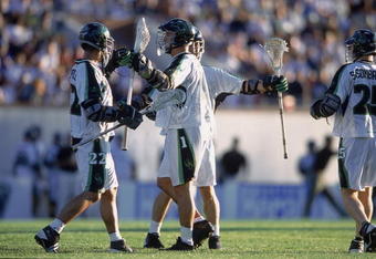 6 Jul 2001:  Gary Gait #1 and Casey Powell #22 of the Long Island Lizards are on the field during the Major League Lacrosse game against the Boston Cannons at Cawley Field in Hudson, Massachusetts.  The Lizards defeated the Cannons 11-10.Mandatory Credit: Ezra Shaw  /Allsport