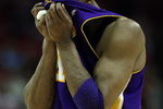 HOUSTON - MAY 14:  Guard Kobe Bryant #24 of the Los Angeles Lakers wipes his face during play against the Houston Rockets in Game Six of the Western Conference Semifinals during the 2009 NBA Playoffs at Toyota Center on May 14, 2009 in Houston, Texas. NOTE TO USER: User expressly acknowledges and agrees that, by downloading and or using this photograph, User is consenting to the terms and conditions of the Getty Images License Agreement.  (Photo by Ronald Martinez/Getty Images)