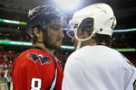 WASHINGTON - MAY 13: Alex Ovechkin #8 of the Washington Capitals and Sidney Crosby #87 of the Pittsburgh Penguins shake hands after Pittsburgh's 6-2 victory in Game Seven of the Eastern Conference Semifinal Round of the 2009 Stanley Cup Playoffs at Verizon Center May 13, 2009 in Washington, DC.  (Photo by Bruce Bennett/Getty Images)