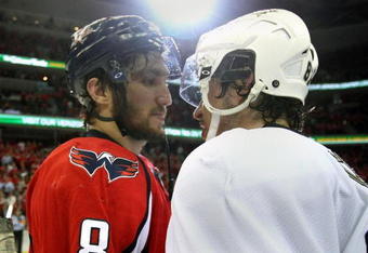 WASHINGTON - MAY 13: Alex Ovechkin #8 of the Washington Capitals and Sidney Crosby #87 of the Pittsburgh Penguins shake hands after Pittsburgh's 6-2 victory in Game Seven of the Eastern Conference Semifinal Round of the 2009 Stanley Cup Playoffs at Verizon Center May 13, 2009 in Washington, DC.  (Photo by Bruce Bennett/Getty Images)