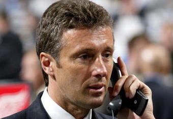 COLUMBUS, OH - JUNE 23:  General manager Doug Wilson of the San Jose Sharks talks on the telephone during the 2007 NHL Entry Draft at Nationwide Arena on June 23, 2007 in Columbus, Ohio.  (Photo by Dave Sandford/Getty Images)