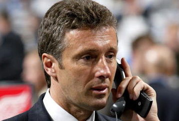 COLUMBUS, OH - JUNE 23:  General manager Doug Wilson of the San Jose Sharks talks on the telephone during the 2007 NHL Entry Draft at Nationwide Arena on June 23, 2007 in Columbus, Ohio.  (Photo by Dave Sandford/Getty Images)