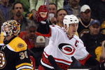BOSTON - MAY 14:  Rod Brind'Amour #17 of the Carolina Hurricanes celebrates his goal as Tim Thomas #30 of the Boston Bruins looks on during Game Seven of the Eastern Conference Semifinal Round of the 2009 Stanley Cup Playoffs on May 14, 2009 at the TD Banknorth Garden in Boston, Massachusetts. The Hurricanes defeated the Bruins 3-2 in overtime.  (Photo by Elsa/Getty Images)