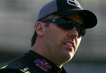 FONTANA, CA - FEBRUARY 20:  Jeremy Mayfield, driver of the #41 All Sport Toyota, waits by his car during qualifying for the NASCAR Sprint Cup Series Auto Club 500 at Auto Club Speedway on February 20, 2009 in Fontana, California.  (Photo by Todd Warshaw/Getty Images for NASCAR)