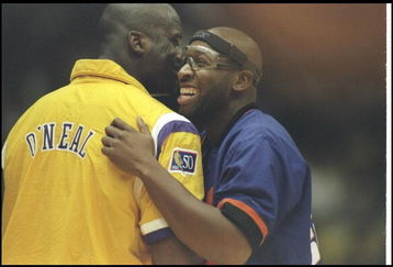 1 Nov 1996:  Center Shaquille O''Neal of the Los Angeles Lakers (left) and center Wayman Tisdale of the Phoenix Suns embrace during a game at the Great Western Forum in Inglewood, California.  The Lakers won the game, 96-82.    Mandatory Credit: Jed Jacobs