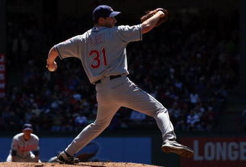 ARLINGTON, TX - APRIL 6:  Pitcher Cliff Lee #31 of the Cleveland Indians throws against the Texas Rangers during the home opener at Rangers Ballpark April 6, 2009 in Arlington, Texas.  (Photo by Ronald Martinez/Getty Images)