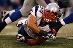EAST RUTHERFORD, NJ - AUGUST 28:  Linebacker Tedy Bruschi #54 of the New England Patriots is kicked in the face by Brandon Jacobs during a preseason game against the New York Giants on August 28, 2008 at Giants Stadium in East Rutherford, New Jersey.  (Photo by Mike Ehrmann/Getty Images)