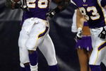 MINNEAPOLIS - JANUARY 4:  Adrian Peterson #28 of the Minnesota Vikings celebrates his touchdown with teammate Jeff Dugan #83 in the first half against the Philadelphia Eagles during the NFC Wild Card playoff game on January 4, 2009 at the Hubert H. Humphrey Metrodome in Minneapolis, Minnesota. (Photo by Elsa/Getty Images)