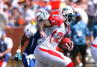 HONOLULU, HI - FEBRUARY 08: Running back Ronnie Brown #23 of the AFC All-Stars Miami Dolphins runs the ball against the NFC All-Stars in the 2009 NFL Pro Bowl at Aloha Stadium on February 8, 2009 in Honolulu, Hawaii. The NFC defeated the AFC 30-21. (Photo by Paul Spinelli/Getty Images)
