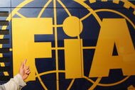 NORTHAMPTON, UNITED KINGDOM - JULY 04:  Former F1 World Champion and President of the British Racing Drivers Club Damon Hill, is seen outside the FIA motorhome following practice for the British Formula One Grand Prix at Silverstone on July 4, 2008 in Northampton, England.  (Photo by Mark Thompson/Getty Images)