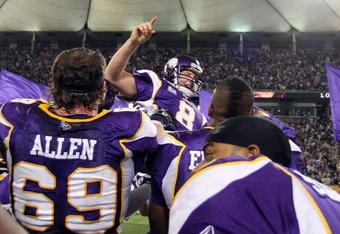 MINNEAPOLIS - DECEMBER 28:   Ryan Longwell #8 of the Minnesota Vikings  is hoisted up by teammates after he kicked the game winning field goal against the New York Giants on December 28,2008 at the Hubert H. Humphrey Metrodome in Minneapolis, Minnesota. The Vikings defeated the Giants 20-19.(Photo by Elsa/Getty Images)