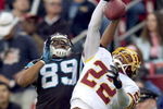 LANDOVER, MD - NOVEMBER 26:  Carlos Rogers #22 of the Washington Redskins knocks the ball away from Steve Smith #89 of the Carolina Panthers November 26, 2006 at FedEx Field in Landover, Maryland. The Redskins won the game, 17-13.  (Photo by Greg Fiume/Getty Images)  