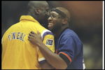 1 Nov 1996:  Center Shaquille O''Neal of the Los Angeles Lakers (left) and center Wayman Tisdale of the Phoenix Suns embrace during a game at the Great Western Forum in Inglewood, California.  The Lakers won the game, 96-82.    Mandatory Credit: Jed Jacobs