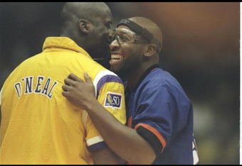 1 Nov 1996:  Center Shaquille O''Neal of the Los Angeles Lakers (left) and center Wayman Tisdale of the Phoenix Suns embrace during a game at the Great Western Forum in Inglewood, California.  The Lakers won the game, 96-82.    Mandatory Credit: Jed Jacobs