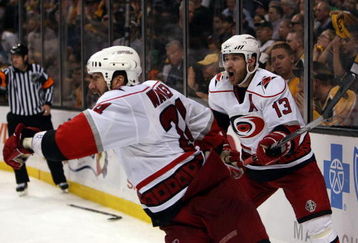 BOSTON - MAY 14:  Scott Walker #24 and Ray Whitney #13 of the Carolina Hurricanes celebrate Walker's game winning goal in overtime against the Boston Bruins during Game Seven of the Eastern Conference Semifinal Round of the 2009 Stanley Cup Playoffs on May 14, 2009 at the TD Banknorth Garden in Boston, Massachusetts. The Hurricanes defeated the Bruins 3-2 in overtime. (Photo by Elsa/Getty Images)