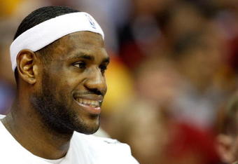 CLEVELAND - APRIL 21:  LeBron James #23 of the Cleveland Cavaliers smiles in Game Two of the Eastern Conference Quarterfinals against the Detroit Pistons during the 2009 NBA Playoffs at Quicken Loans Arena on April 21, 2009 in Cleveland, Ohio.  The Cavaliers won 94-82.  NOTE TO USER: User expressly acknowledges and agrees that, by downloading and or using this photograph, User is consenting to the terms and conditions of the Getty Images License Agreement.  (Photo by Gregory Shamus/Getty Images)