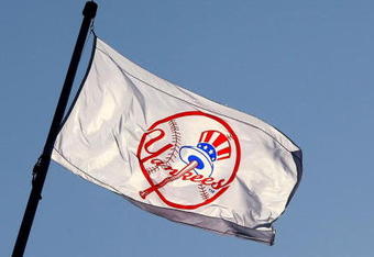 NEW YORK - APRIL 16: A Yankee flag waves over the new stadium during opening day between the New York Yankees and the Cleveland Indians at the new Yankee Stadium on April 16, 2009 in the Bronx borough of New York City. This is the first regular season MLB game being played at the new venue which replaced the old Yankee Stadium as the Yankees home field.  (Photo by Chris McGrath/Getty Images)