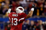 TAMPA, FL - FEBRUARY 01:  Kurt Warner #13 of the Arizona Cardinals celebrates after he threw a 64-yard touchdown to Larry Fitzgerald #11 in the fourth quarter against the Pittsburgh Steelers during Super Bowl XLIII on February 1, 2009 at Raymond James Stadium in Tampa, Florida. The Steelers won 27-23.  (Photo by Chris Graythen/Getty Images)