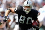 OAKLAND, CA - SEPTEMBER 09:  Zach Miller #80 of the Oakland Raiders carries the ball against the Detroit Lions during the NFL game on September 9, 2007 at McAfee Coliseum in Oakland, California. The Lions won 36-21. (Photo by Jed Jacobsohn/Getty Images)