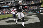 OAKLAND, CA - DECEMBER 21: Chaz Schilens #81 of the Oakland Raiders celebrates scoring a touchdown past Jacques Reeves #35 of the Houston Texans during an NFL game on December 21, 2008 at the Oakland-Alameda County Coliseum in Oakland, California.  (Photo by Jed Jacobsohn/Getty Images)