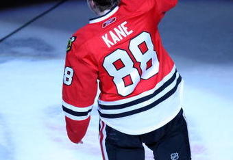 CHICAGO - MAY 11:  Patrick Kane #88 of the Chicago Blackhawks reacts after he was named the #1 star of the game after their 7-5 win against the Vancouver Canucks during Game Six of the Western Conference Semifinal Round of the 2009 Stanley Cup Playoffs on May 11, 2009 at the United Center in Chicago, Illinois.  (Photo by Jonathan Daniel/Getty Images)