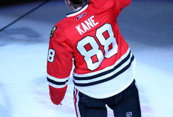 CHICAGO - MAY 11:  Patrick Kane #88 of the Chicago Blackhawks reacts after he was named the #1 star of the game after their 7-5 win against the Vancouver Canucks during Game Six of the Western Conference Semifinal Round of the 2009 Stanley Cup Playoffs on May 11, 2009 at the United Center in Chicago, Illinois.  (Photo by Jonathan Daniel/Getty Images)