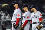 NEW YORK - MAY 05:  (L-R) Josh Beckett #19, Nick Green #22, and Dustin Pedroia of the Boston Red Sox look on against the New York Yankees on May 5, 2009 at Yankee Stadium in the Bronx borough of New York City.  (Photo by Jim McIsaac/Getty Images)