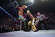 LAS VEGAS - DECEMBER 2:  (U.S. TABLOIDS OUT)   WWE wrestlers Rey Mysterio (in gold) and Chris Jericho perform on stage during the '1st Annual Video Game Awards' at the MGM Grand Garden Arena December 2, 2003 in Las Vegas, Nevada.  The show premieres on Spike T.V. Thursday, December 4 at 9:00PM ET/PT.  (Photo by Frank Micelotta/Getty Images)
