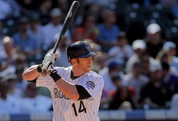 DENVER - APRIL 29:  Matt Murton #14 of the Colorado Rockies takes an at bat against the San Diego Padres during MLB action at Coors Field on April 29, 2009 in Denver, Colorado. The Rockies defeated the Padres 7-5.  (Photo by Doug Pensinger/Getty Images)