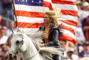 07 Oct 2001:  Denver Broncos mounted mascot gallops along the sideline carrying an american flag during the game against the Kansas City Chiefs at Mile High Stadium in Denver, Colorado. The Broncos  beat  the Chiefs 20-6. DIGITAL IMAGE. Mandatory Credit: Brian Bahr/Allsport