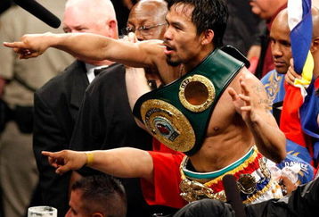 LAS VEGAS - MAY 02:  Manny Pacquiao of the Philippines celebrates after knocking out Ricky Hatton of England in the second round of their junior welterweight title fight at the MGM Grand Garden Arena May 2, 2009 in Las Vegas, Nevada.  (Photo by Ethan Miller/Getty Images)