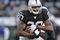 OAKLAND, CA - AUGUST 23:  Running back Darren McFadden #20 of the Oakland Raiders heads downfield against the Arizona Cardinals during a preseason game on August 23, 2008 at the McAfee Coliseum in Oakland, California.  (Photo by Greg Trott/Getty Images)