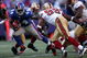 EAST RUTHERFORD, NJ - OCTOBER 19: Ahmad Bradshaw #44 of the New York Giants pushes off a tackle from Manny Lawson #99 of the San Francisco 49ers on October 19, 2008 at Giant Stadium in East Rutherford, New Jersey. The Giants defeated the 49ers 27-19. (Photo by Chris Trotman/Getty Images)