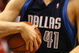 MIAMI - JANUARY 21:  Forward Dirk Nowitzki #41 of the Dallas Mavericks holds onto the ball after a rebound against the Miami Heat in the fourth period on January 21, 2007 at the American Airlines Arena in Miami  Florida.  NOTE TO USER: User expressly acknowledges and agrees that, by downloading and/or using this Photograph, User is consenting to the terms and conditions of the Getty Images License Agreement.  (Photo by Eliot J. Schechter/Getty Images)