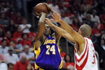 HOUSTON - MAY 14:  Guard Kobe Bryant #24 of the Los Angeles Lakers takes a shot against Shane Battier #31 of the Houston Rockets in Game Six of the Western Conference Semifinals during the 2009 NBA Playoffs at Toyota Center on May 14, 2009 in Houston, Texas. NOTE TO USER: User expressly acknowledges and agrees that, by downloading and or using this photograph, User is consenting to the terms and conditions of the Getty Images License Agreement.  (Photo by Ronald Martinez/Getty Images)