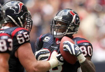 HOUSTON - OCTOBER 05:  Wide receiver Andre Johnson #80 of the Houston Texans celebrates with guard Mike Brisiel #65 after makiing a touchdown catch against the Indianapolis Colts on October 5, 2008 at Reliant Stadium in Houston, Texas.  (Photo by Stephen Dunn/Getty Images)