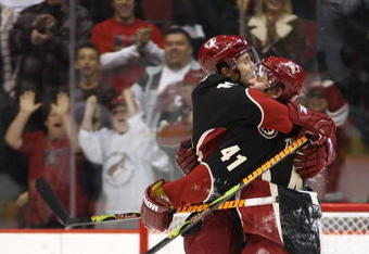 GLENDALE, AZ - APRIL 11:  Enver Lisin #18 and Viktor Tikhonov #41 of the Phoenix Coyotes celebrate after Tikhonov scored the game winning shootout goal against the Anaheim Ducks during the NHL game at Jobing.com Arena on April 11, 2009 in Glendale, Arizona. The Coyotes defeated the Ducks in 5-4 in an overtime shootout.  (Photo by Christian Petersen/Getty Images)