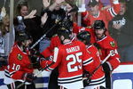 CHICAGO - MAY 11:  Martin Havlat #24 (R), Brian Campbell #51, Patrick Sharp #10 (L), Jonathan Toews #19 and Cam Barker #25 of the Chicago Blackhawks celebrate after Toews scored a power play goal in the third period against the Vancouver Canucks during Game Six of the Western Conference Semifinal Round of the 2009 Stanley Cup Playoffs on May 11, 2009 at the United Center in Chicago, Illinois. The Blackhawks won 7-5.  (Photo by Jonathan Daniel/Getty Images)