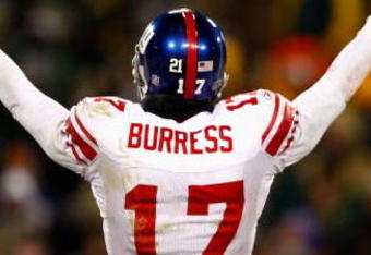 GREEN BAY, WI - JANUARY 20:  Wide receiver Plaxico Burress #17 of the New York Giants reacts to the crowd during the NFC championship game against the Green Bay Packers on January 20, 2008 at Lambeau Field in Green Bay, Wisconsin.  (Photo by Jamie Squire/Getty Images)